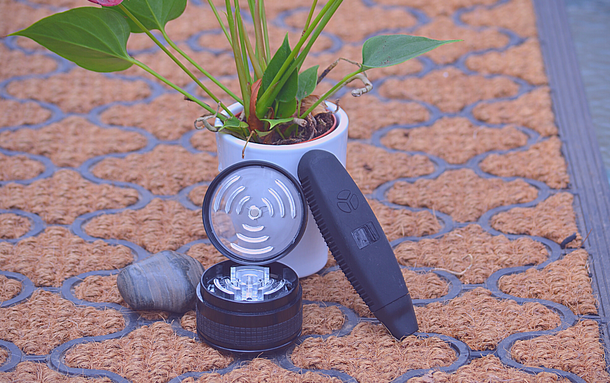 Combustion vape with a dry herb grinder