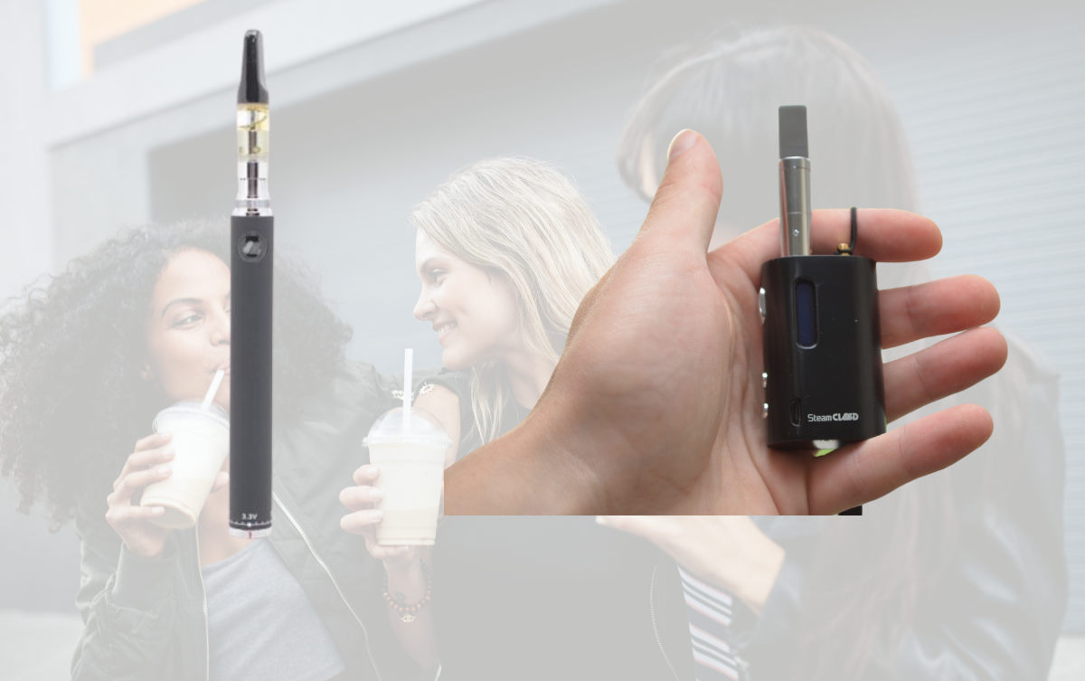 picture of two vapes black one in hand 